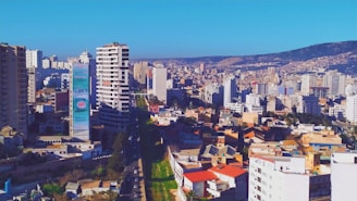 An urban landscape featuring a dense cluster of high-rise buildings.Safe real estate investments wi 