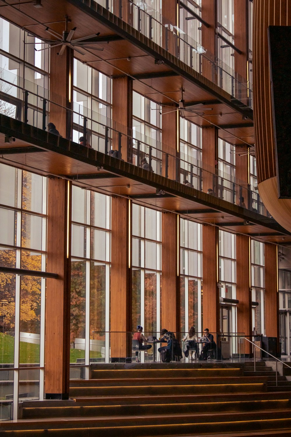 people sitting on chairs inside building