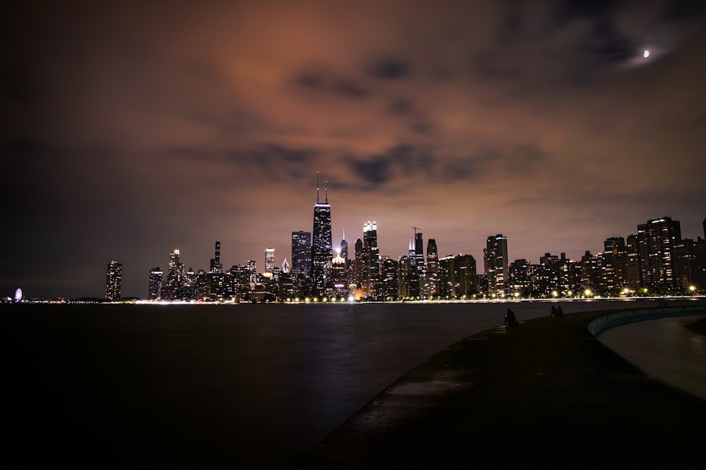 city skyline during night time