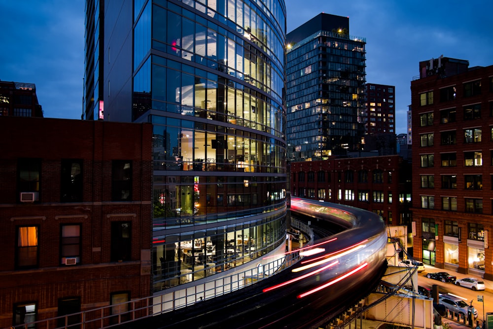 time lapse photography of city buildings during night time