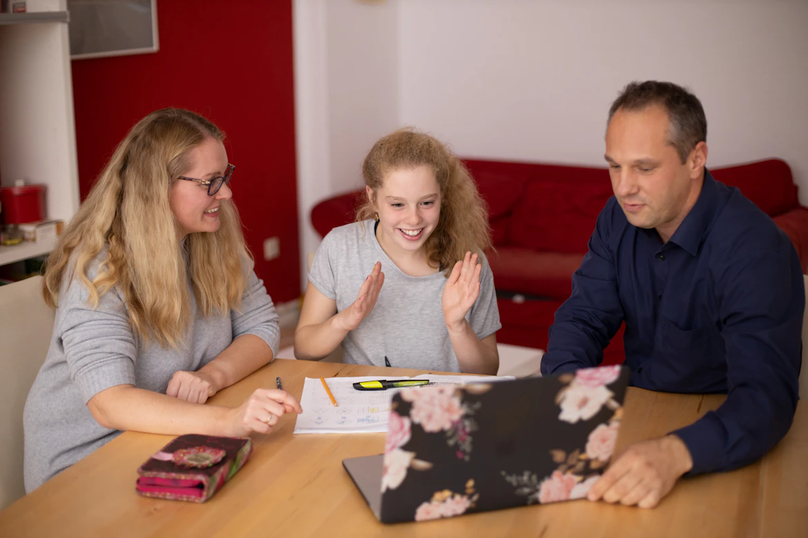 Family discussing financial assistance and loan repayment
