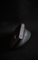 black and gray cordless computer mouse