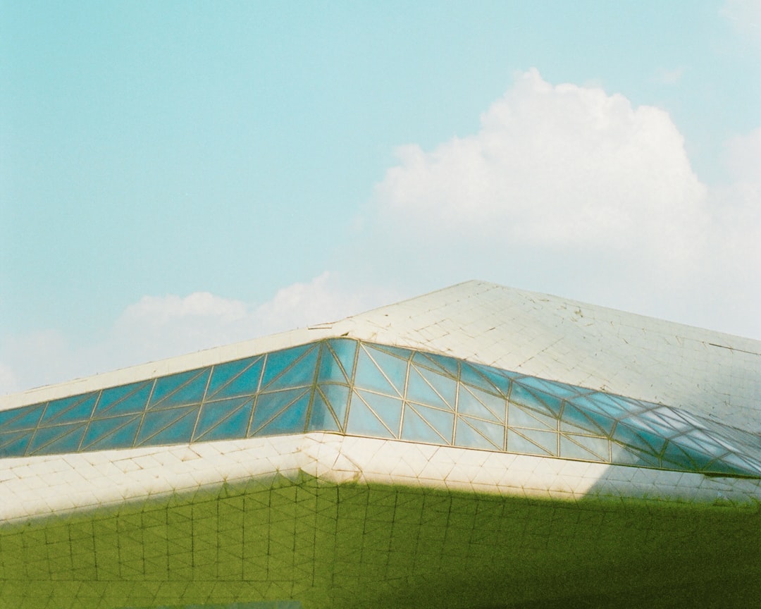 white concrete building under blue sky during daytime