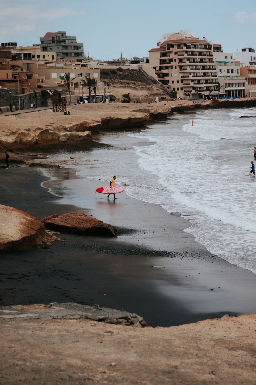 people on beach during daytime