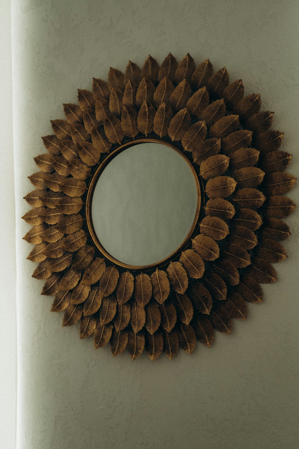 oval brown wooden frame wall mirror