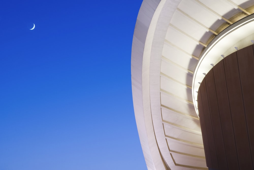 white concrete building under blue sky during daytime