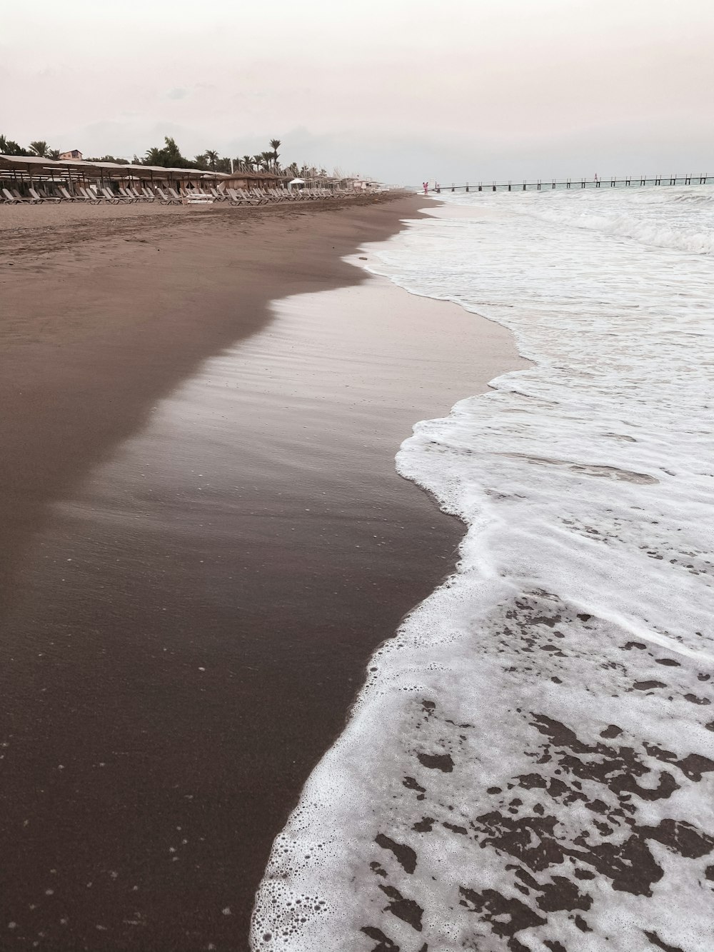 beach shore with white sand during daytime