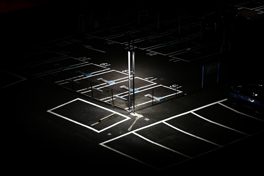 black and white checkered floor, Parking lot at night