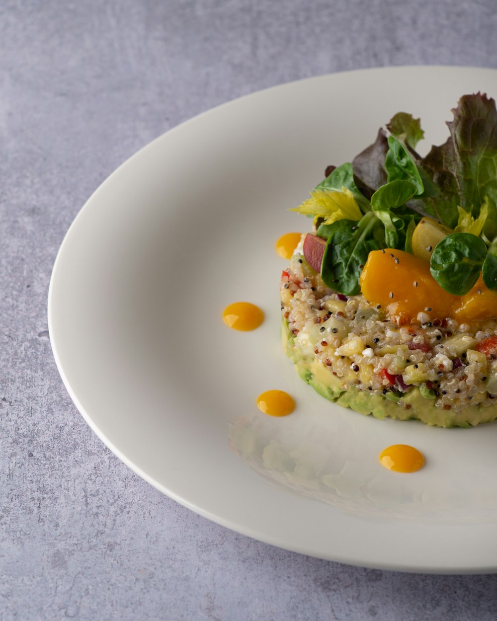 white ceramic plate with rice and green leaf vegetable