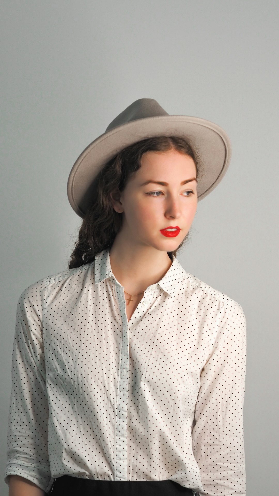 woman in white hat and white button up shirt