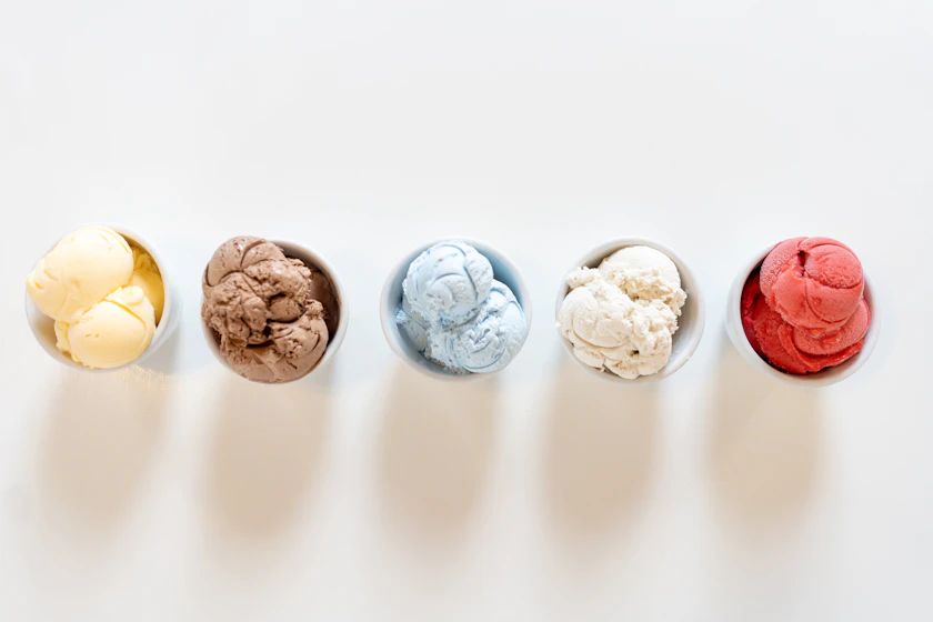 A row of colorful ice cream scoops lined up