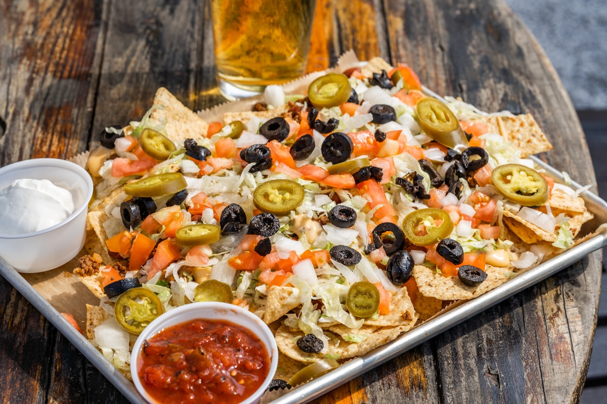 How can I make family nachos stay crispy and not soggy?