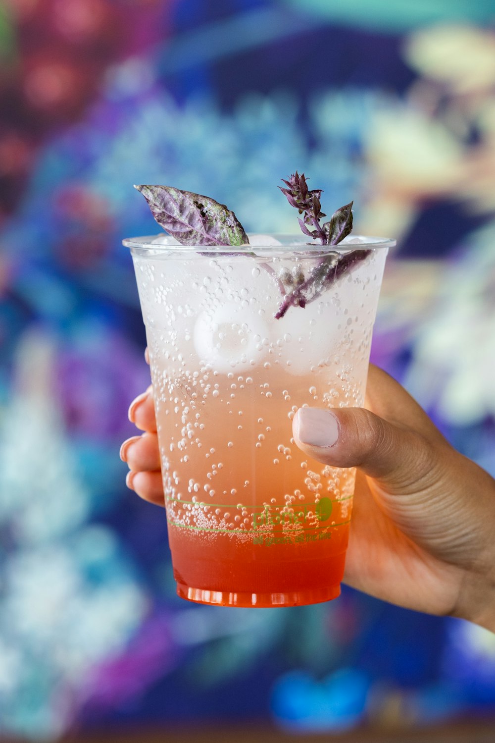 clear drinking glass with orange liquid