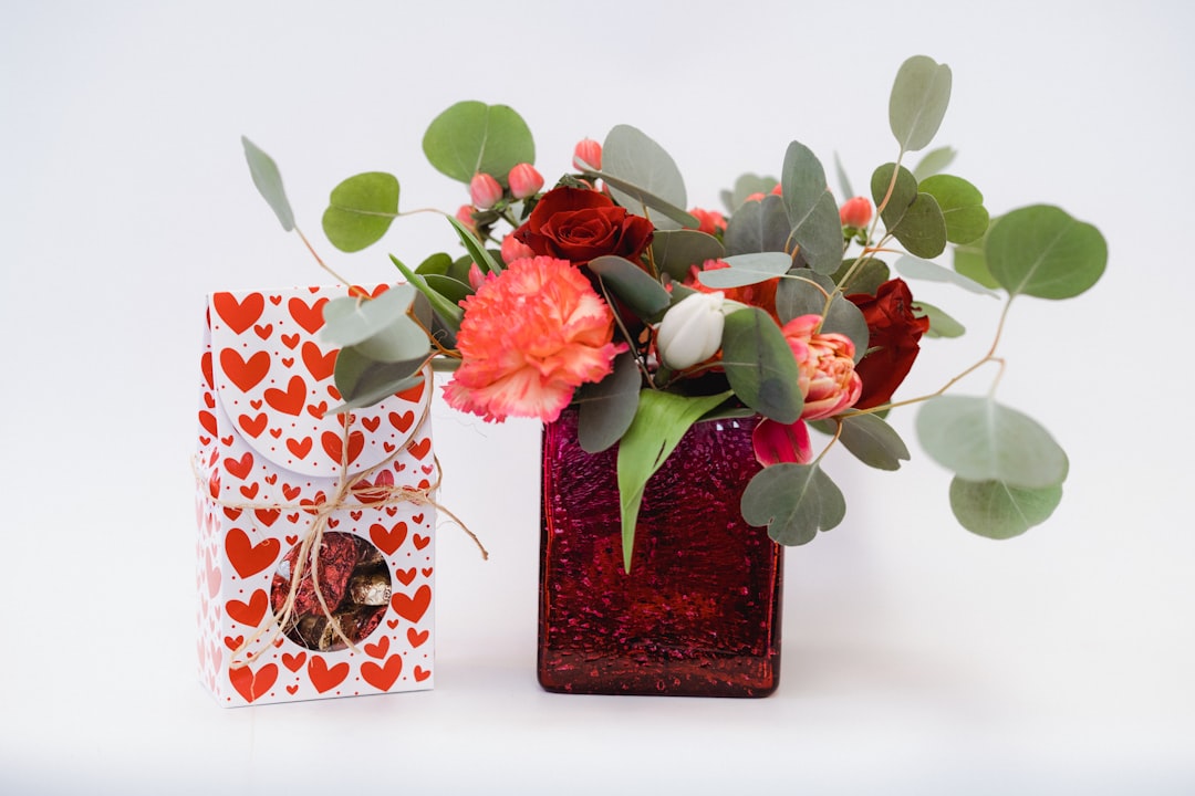 red roses in brown wooden box