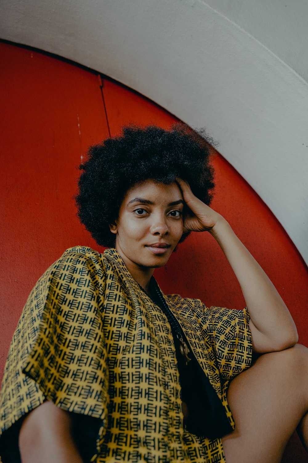 woman in yellow and black plaid button up shirt