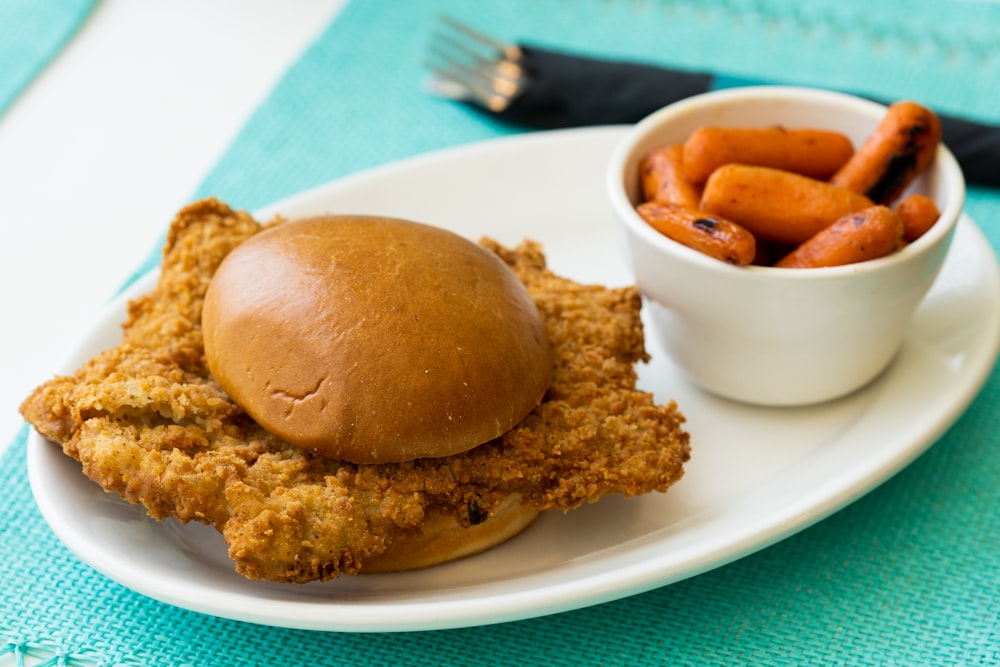 burger on white ceramic plate