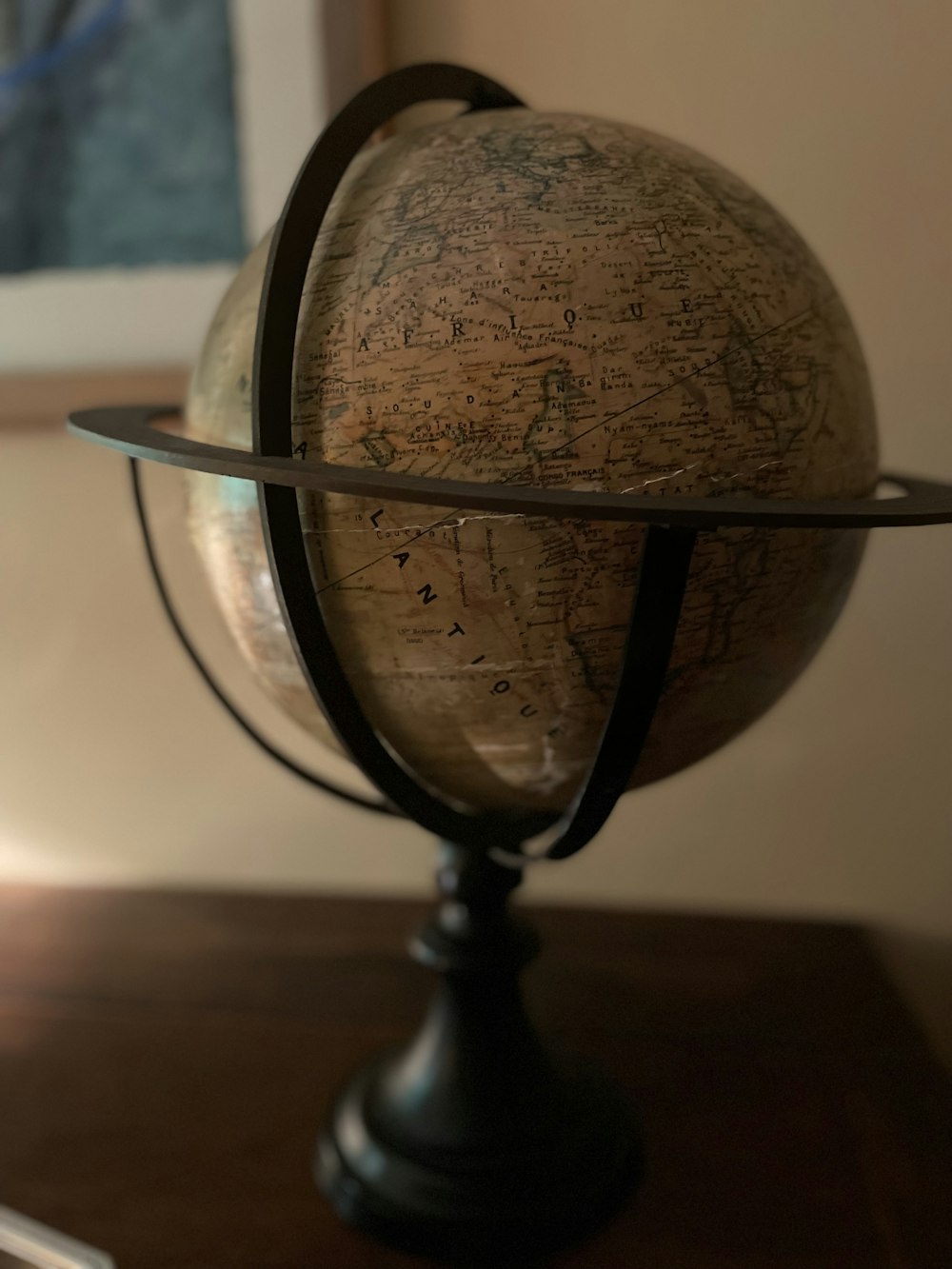 brown and black desk globe