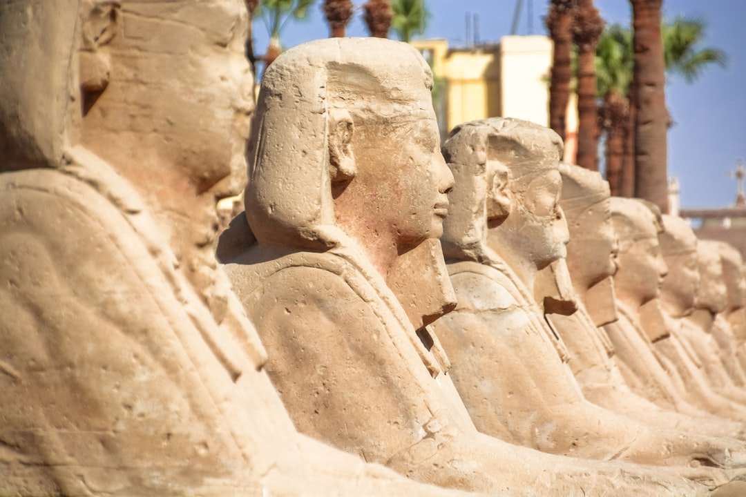 brown concrete statue during daytime