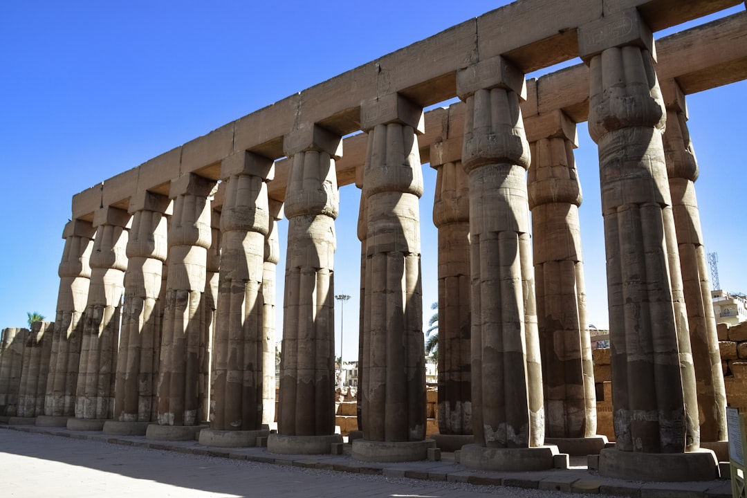 brown concrete pillars under blue sky during daytime