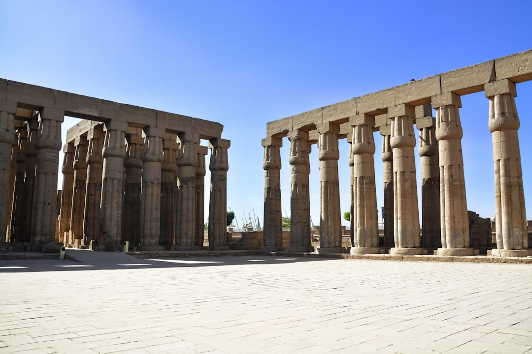 brown concrete pillars under blue sky during daytime