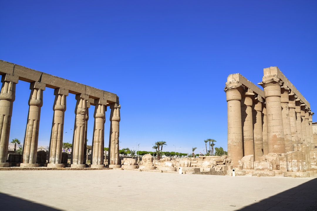 brown concrete columns under blue sky during daytime