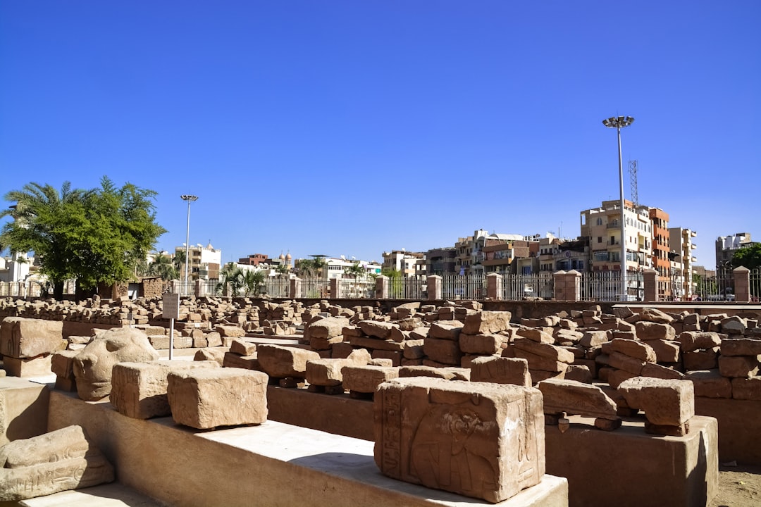 brown concrete building under blue sky during daytime