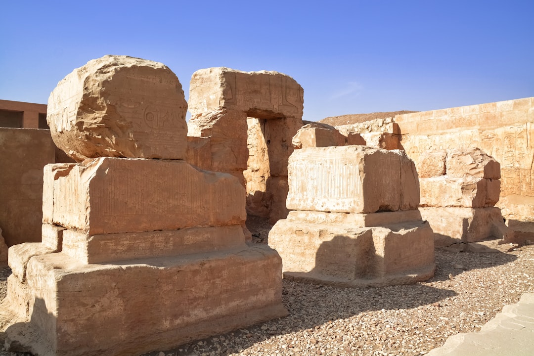 brown rock formation under blue sky during daytime