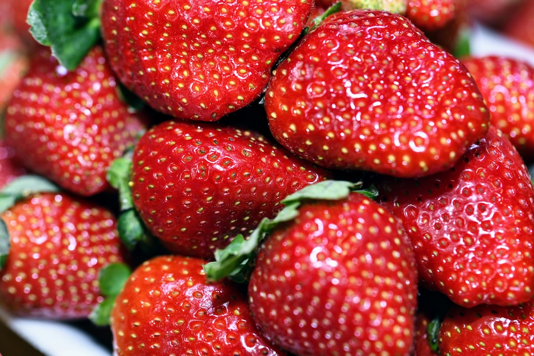 red strawberries on white background