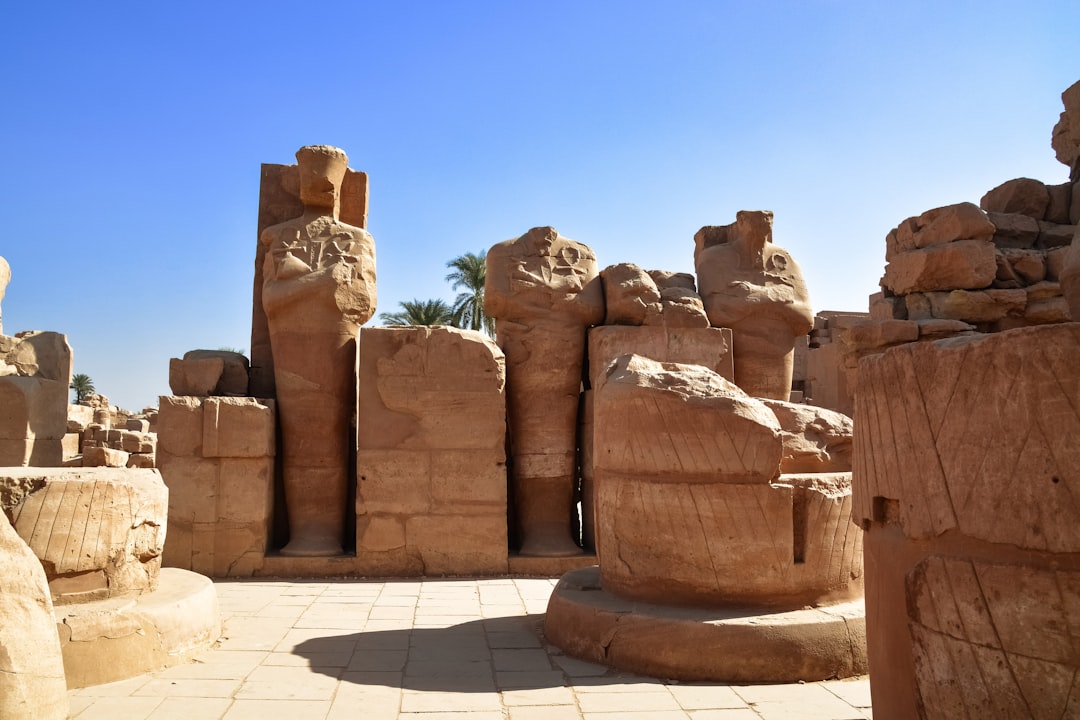 brown rock formation under blue sky during daytime