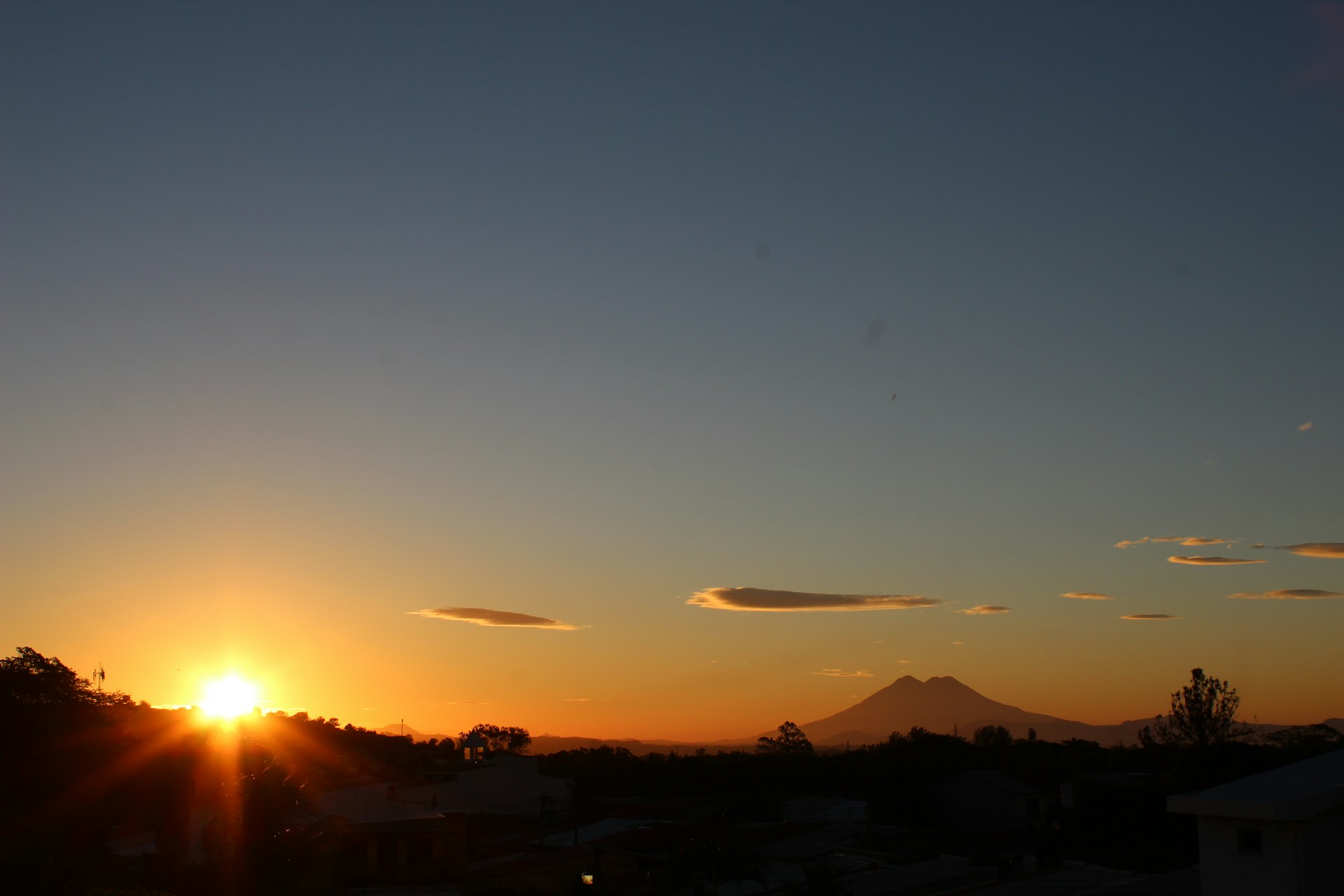 silhouette of mountain during sunset