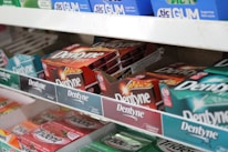 kitkat chocolate bar on white shelf