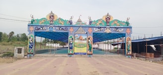 A welcoming entrance of Isodhyan Bhawan Mayapur with traditional decor.