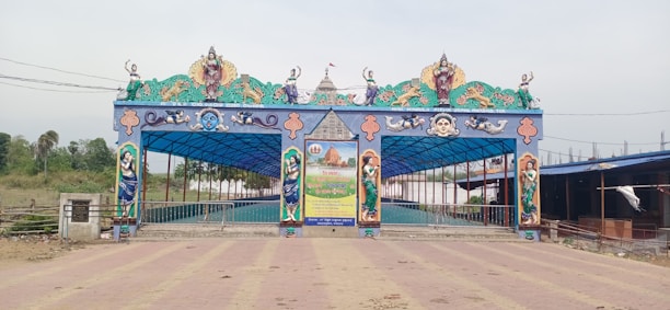 A welcoming entrance of Isodhyan Bhawan Mayapur with traditional decor.