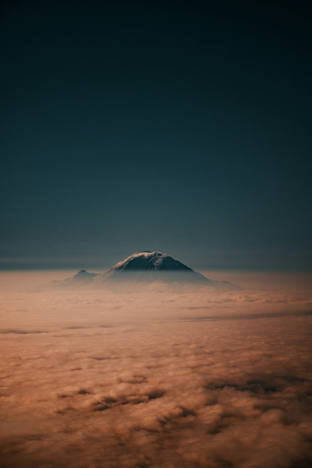 snow covered mountain under blue sky during daytime