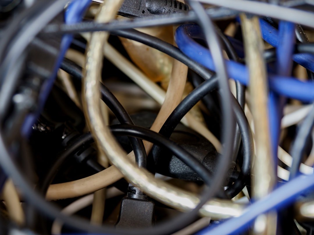 black coated wire on blue and black wires