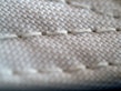Close-up of a high-quality fabric texture with unique stitching details