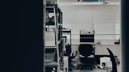 A tranquil office space with law books and legal documents on a table.