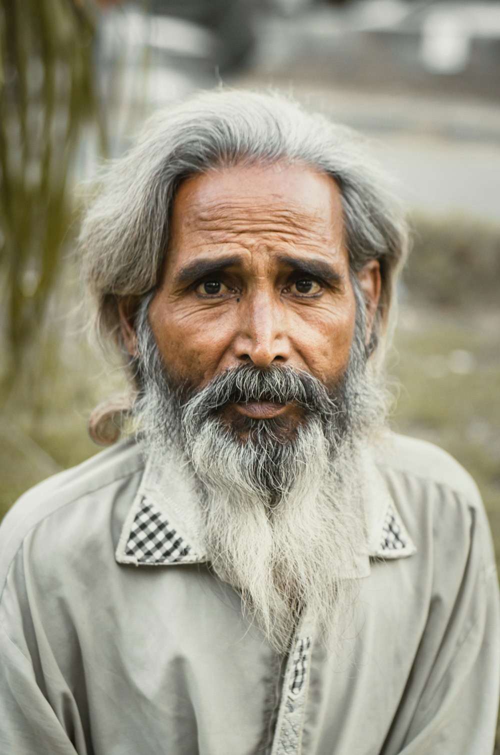 man in grey button up shirt