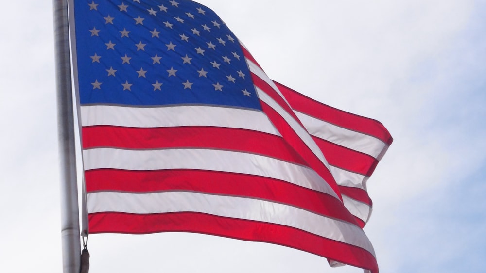 us a flag under white sky during daytime