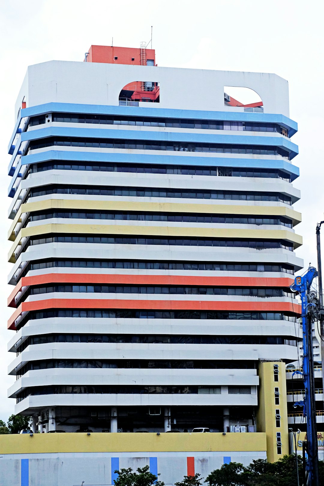 white blue and red concrete building during daytime