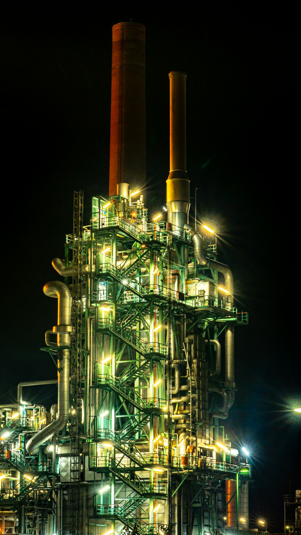 brown and black factory during night time