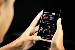 person holding black android smartphone