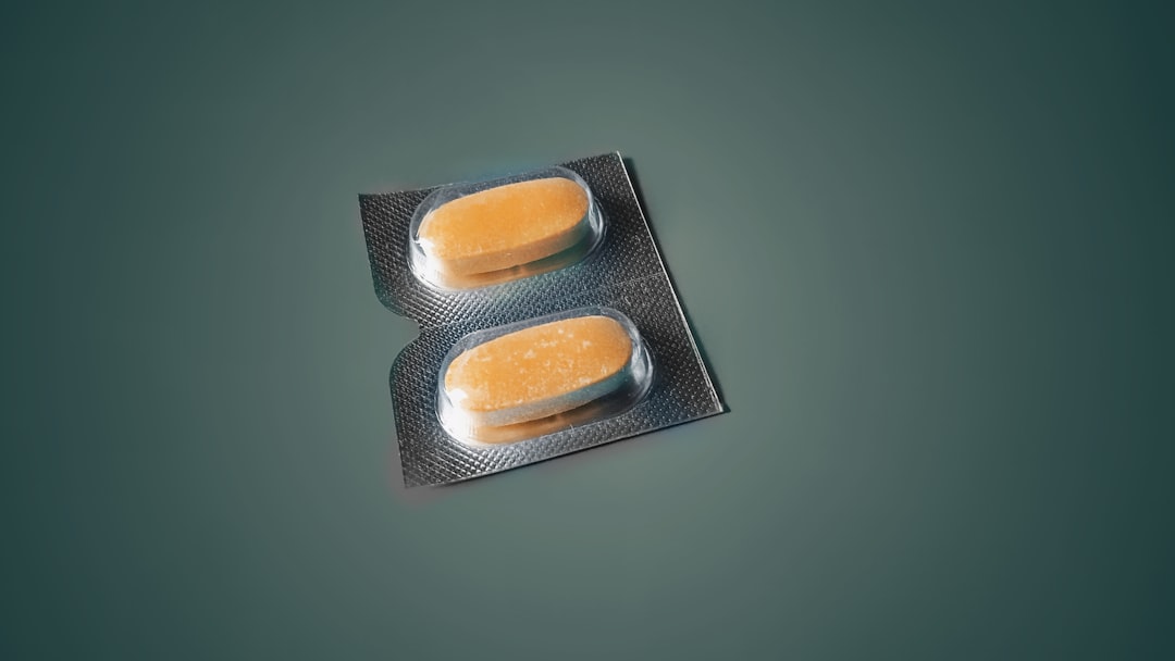 two oval medication pill in blister pack, Take medicine and stay healthy.
