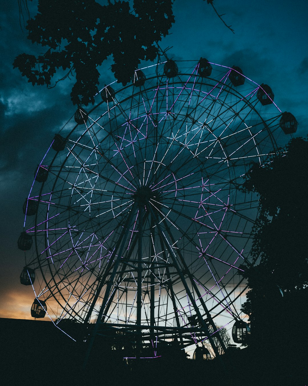 white ferris wheel under blue sky during daytime