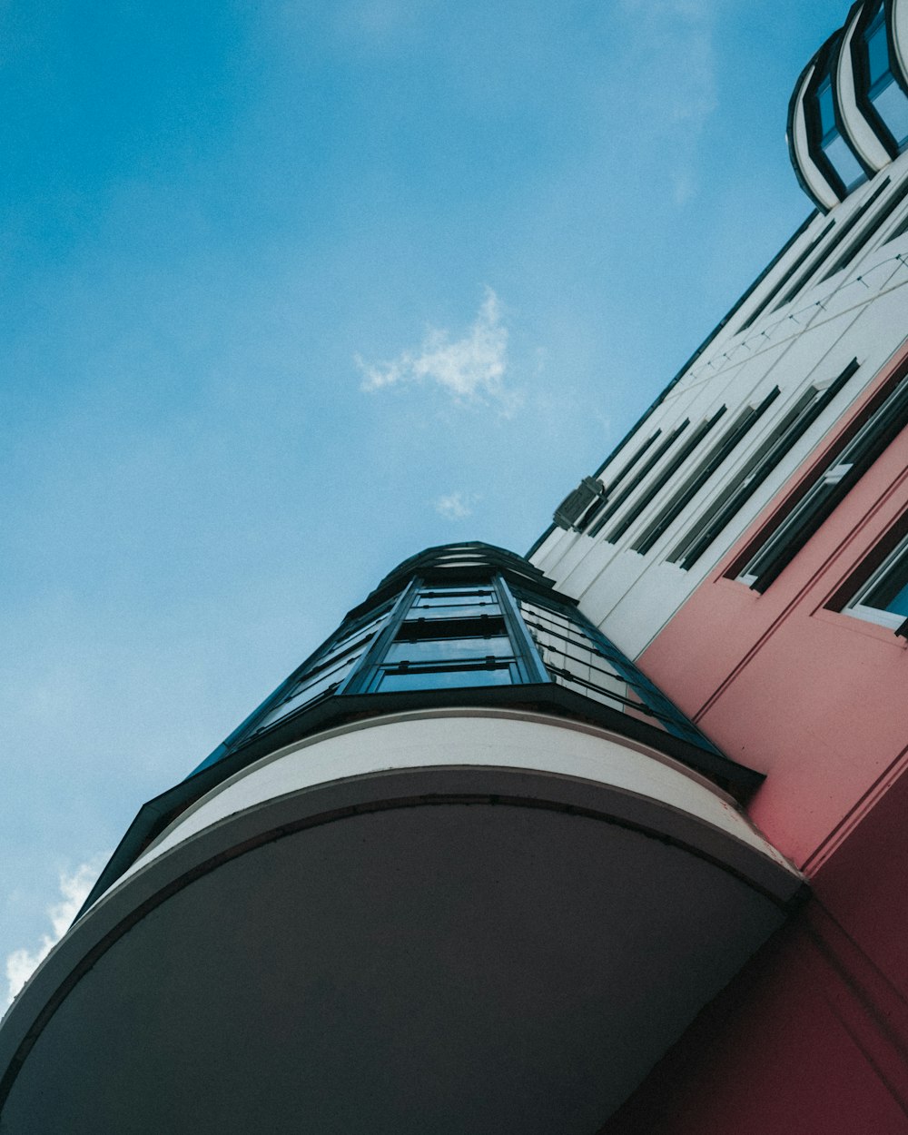 red and black concrete building under blue sky during daytime