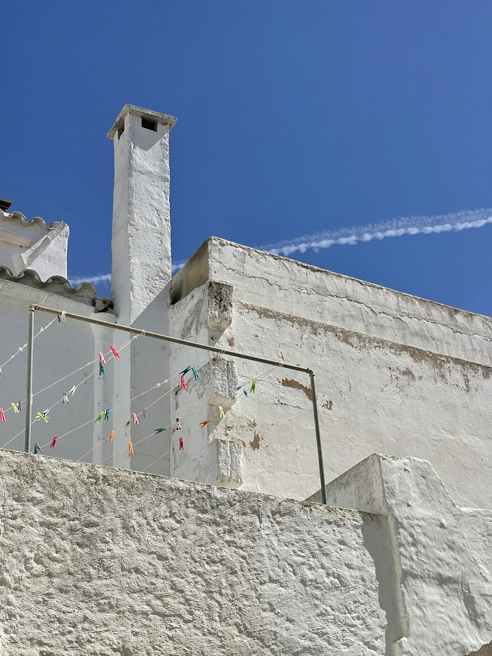 white concrete building under blue sky during daytime