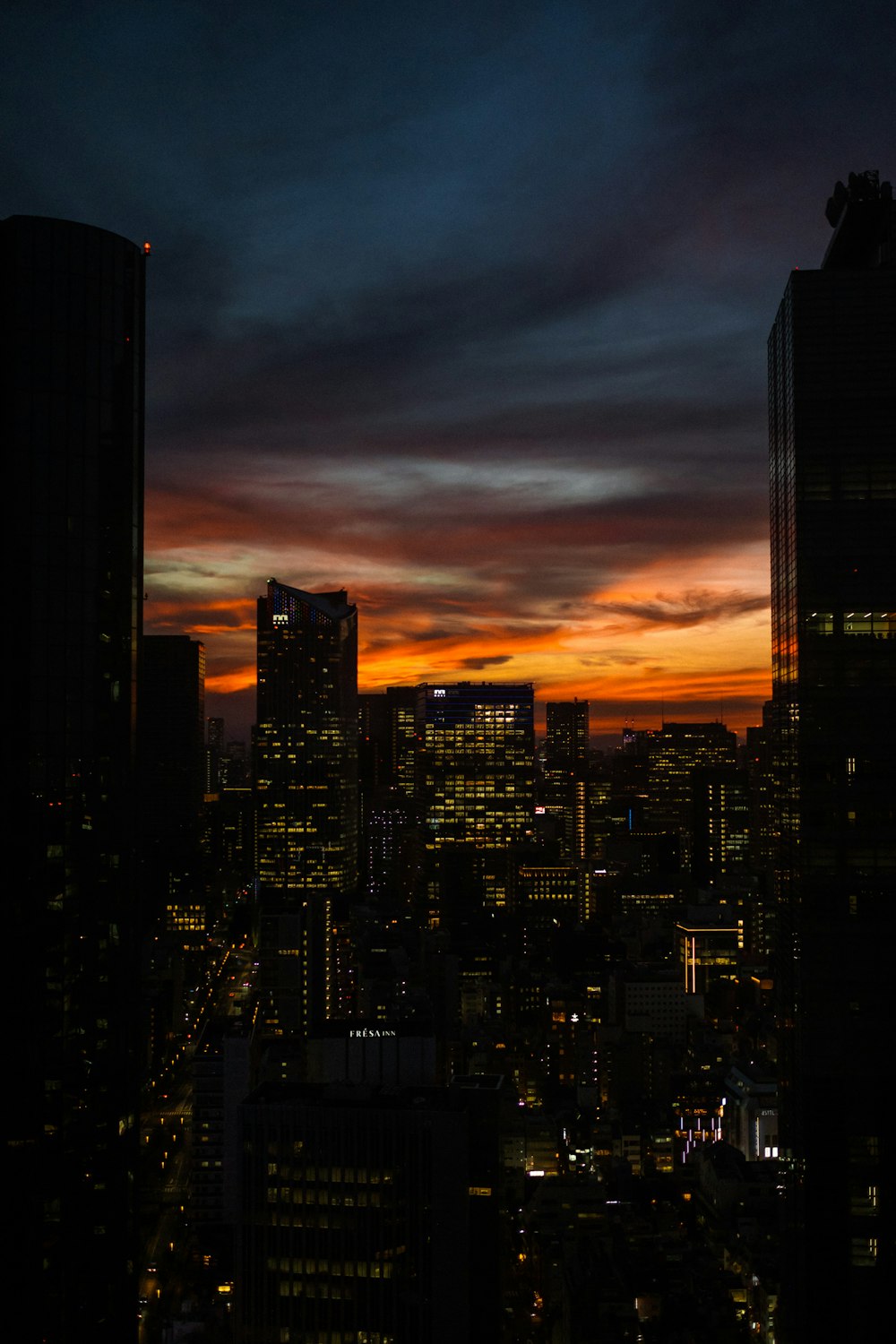 city skyline during night time