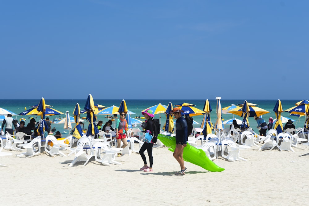 people on beach during daytime