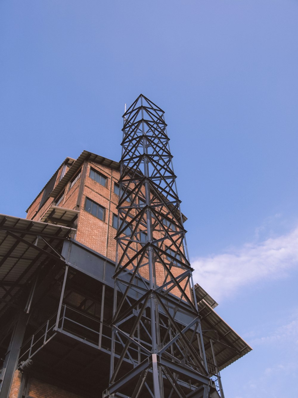 brown concrete building under blue sky during daytime