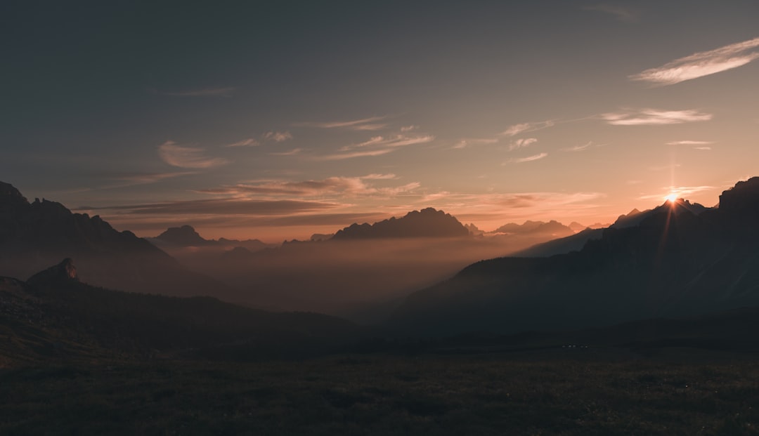 silhouette of mountains during sunset,